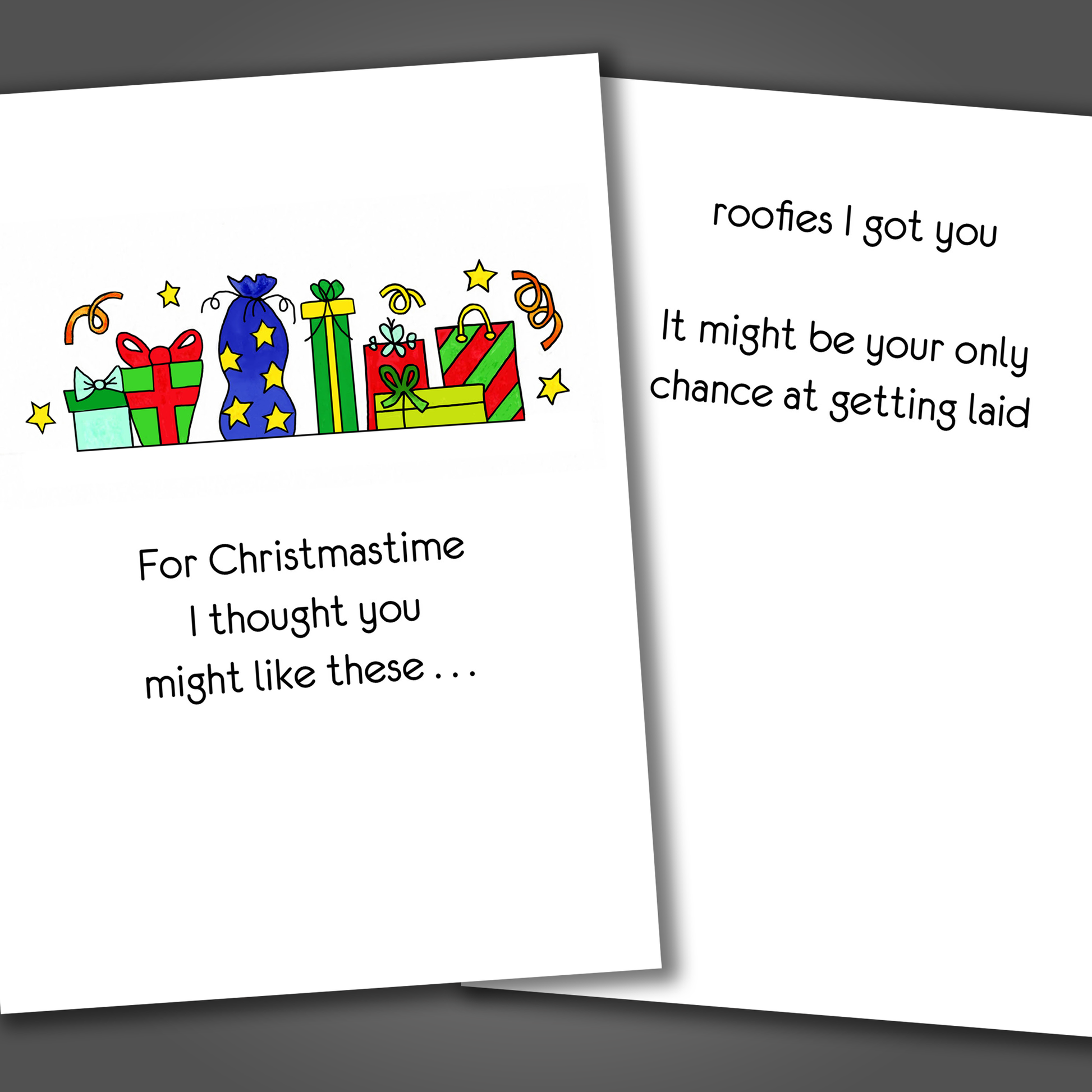 Merry Christmas Card with gifts on the front of the card. Inside is a joke that says I got you roofies and they may be your only chance at getting laid!