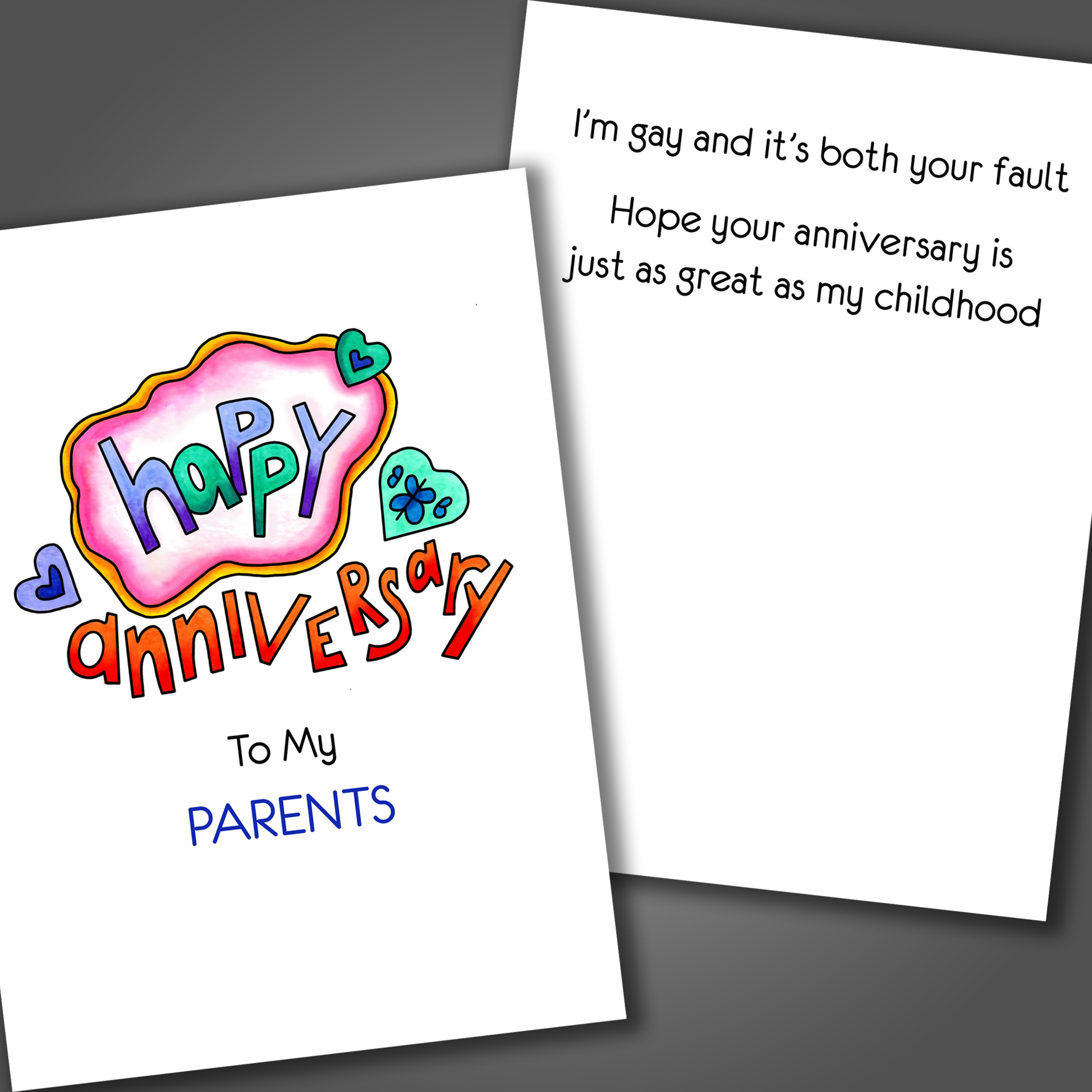 Funny anniversary card for parents with three hearts on front and a funny joke inside of card that says I am gay and it's both your fault!