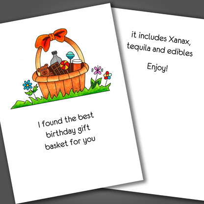 Happy birthday card with a gift basket drawn on the front of the card. Inside the card is a joke that says the gift basket contains Xanax, tequila and edibles.