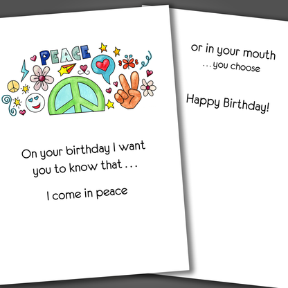 Funny birthday card with green peace symbol drawn on the front of card. Inside the card is a funny adult joke that ends in happy birthday!