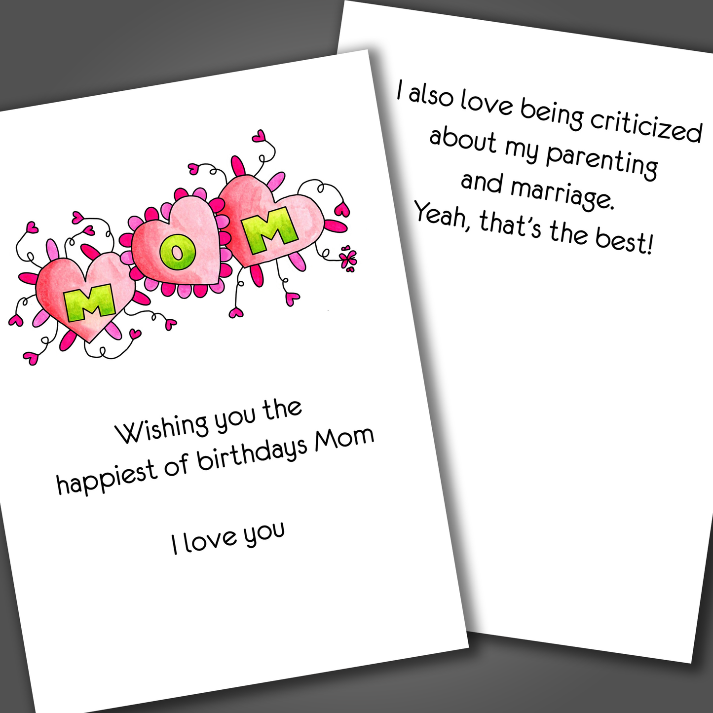 Funny happy birthday mom card with the word mom drawn in green and pink on top of three hearts and a funny joke inside wishing her a happy birthday.