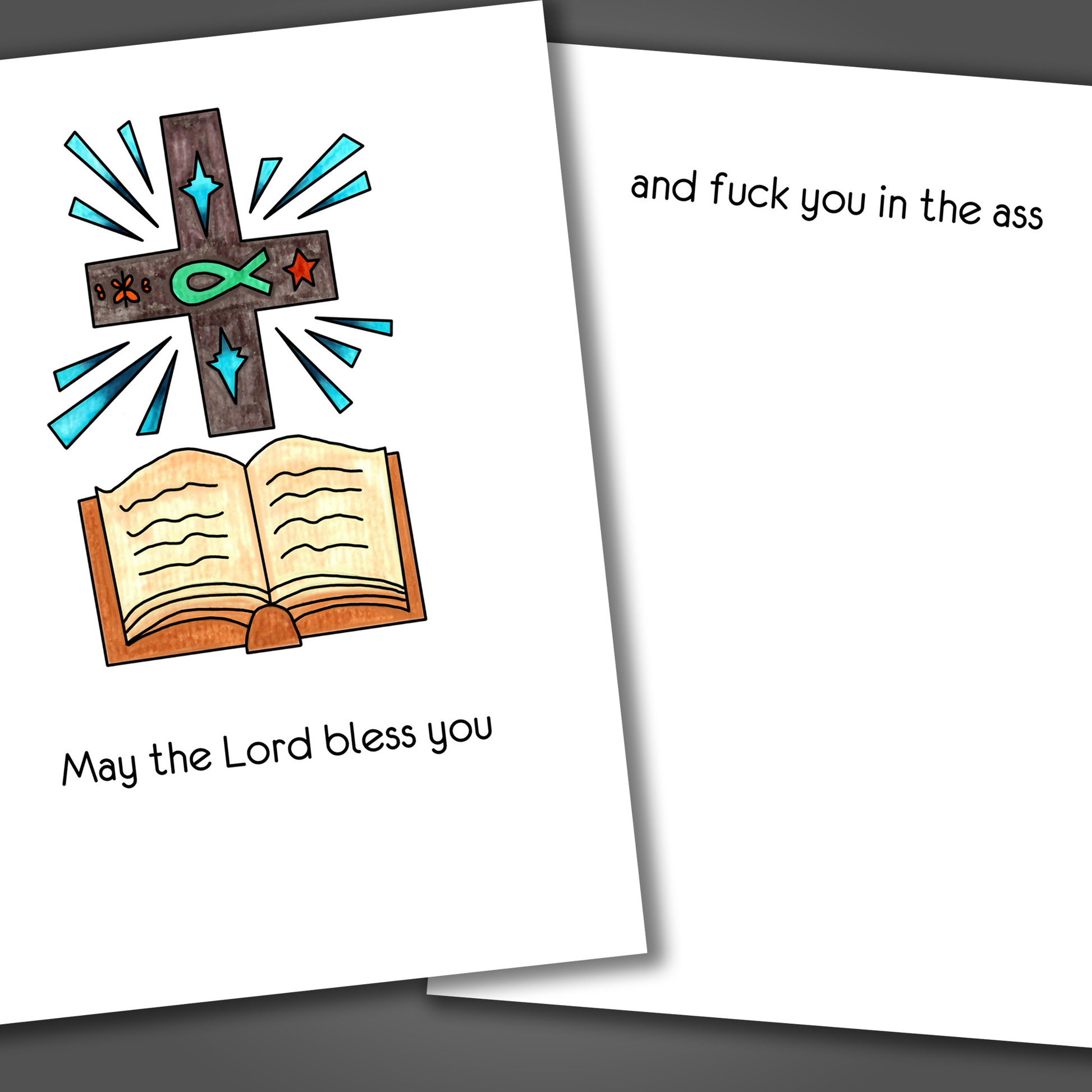 Funny encouragement card with a cross and religious book drawn on the front of the card. Inside the card is a funny joke that says may the Lord bless you and fuck you in the ass.