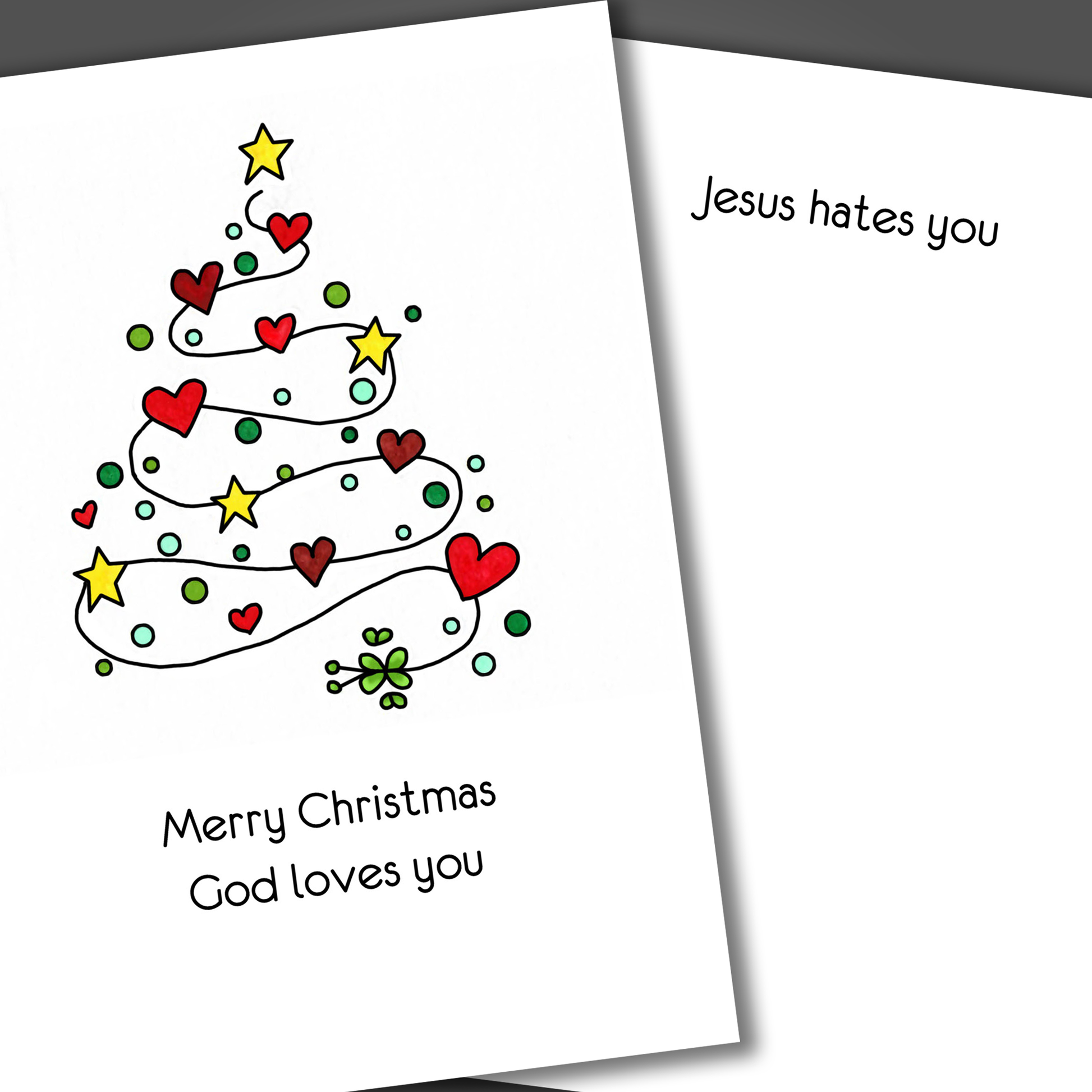 Funny Christmas Card with hearts and tree on the front of the card. Inside the card is a funny joke that says Jesus hates you.