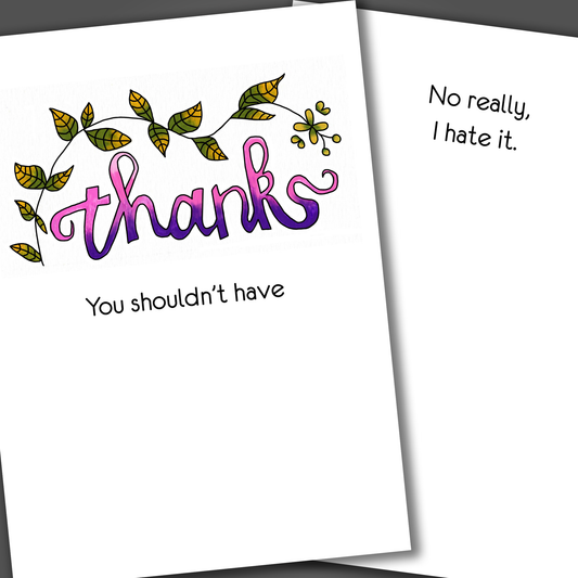 Funny thank you card with the word thanks and leaves drawn on the front of the card. Inside the card is a funny joke that says no really, I hate it.